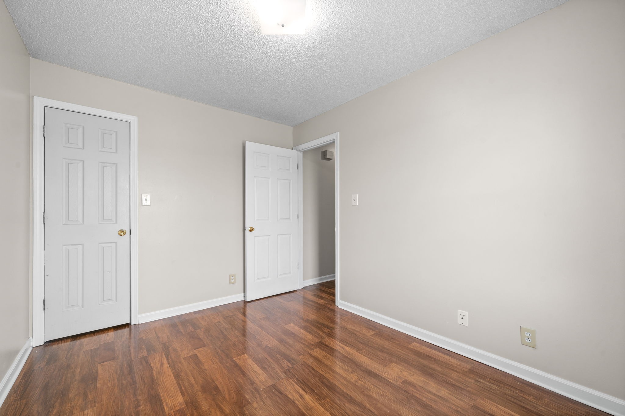 241 Bumpus Mill Road Oak Grove, KY 42262 - Photo 21 of 31 a view of an empty room with wooden floor