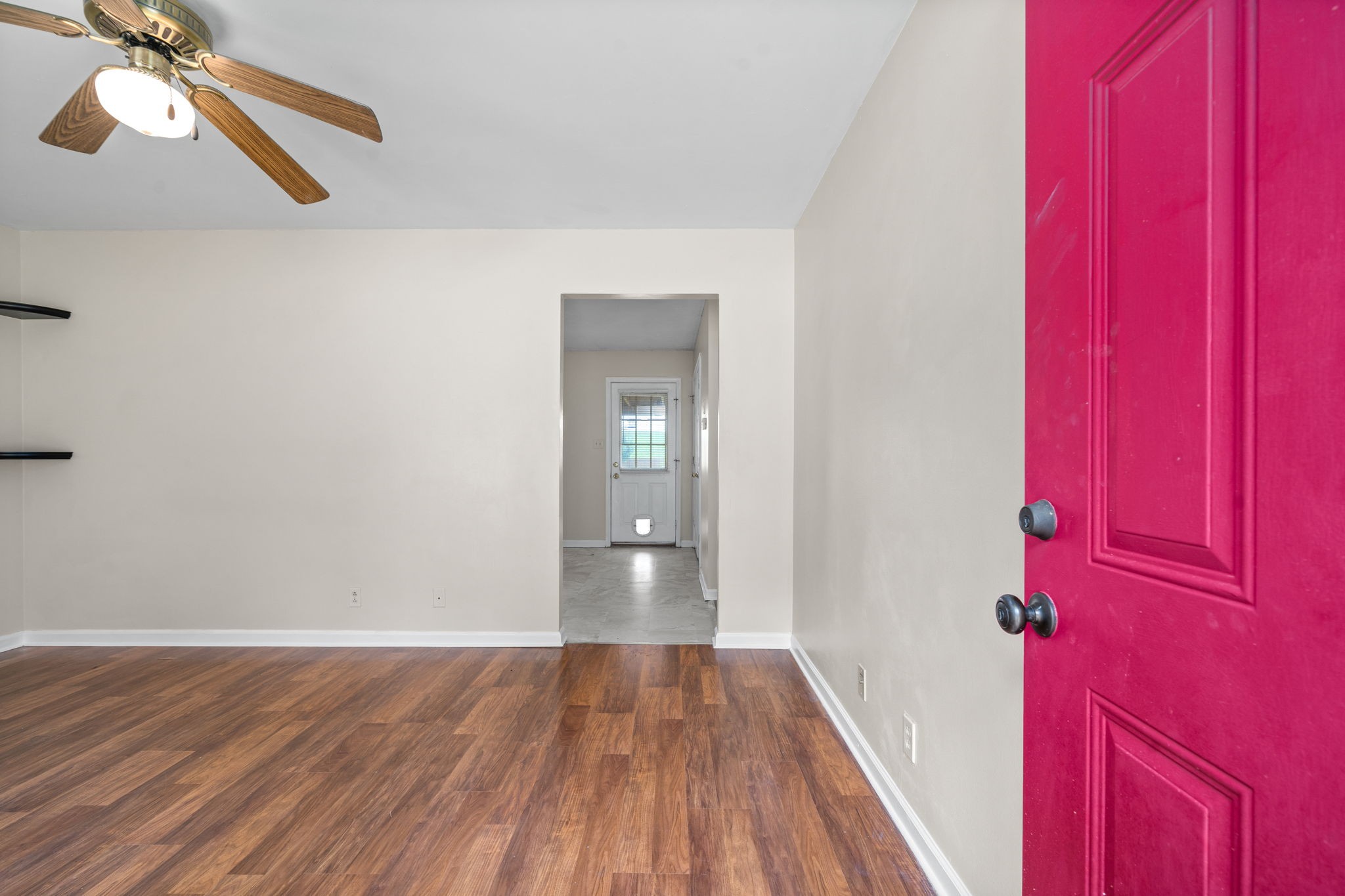 241 Bumpus Mill Road Oak Grove, KY 42262 - Photo 7 of 31 a view of a hallway with wooden floor and staircase