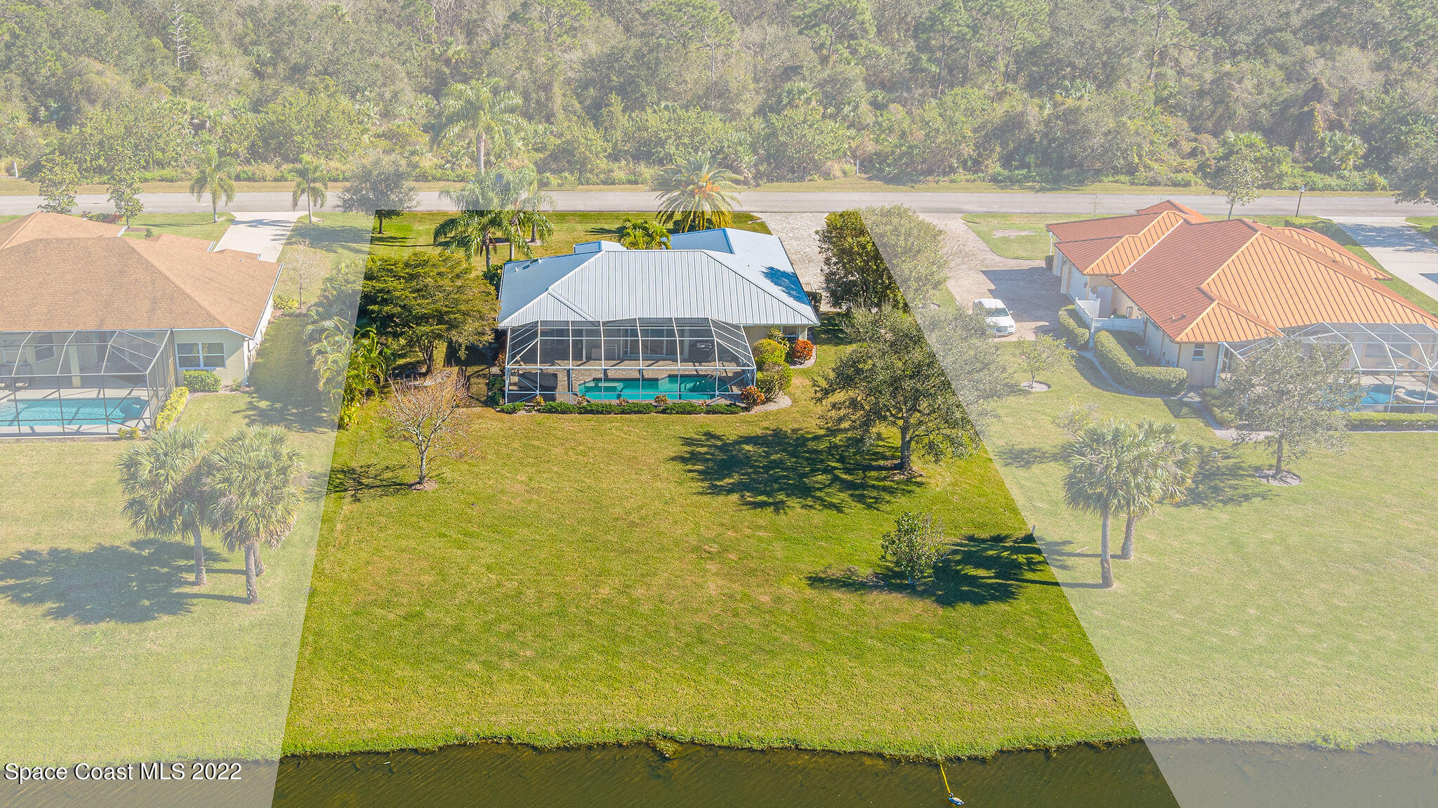 1566 Eagles Circle Sebastian, FL 32958 - Photo 2 of 59 a view of a lake with a houses