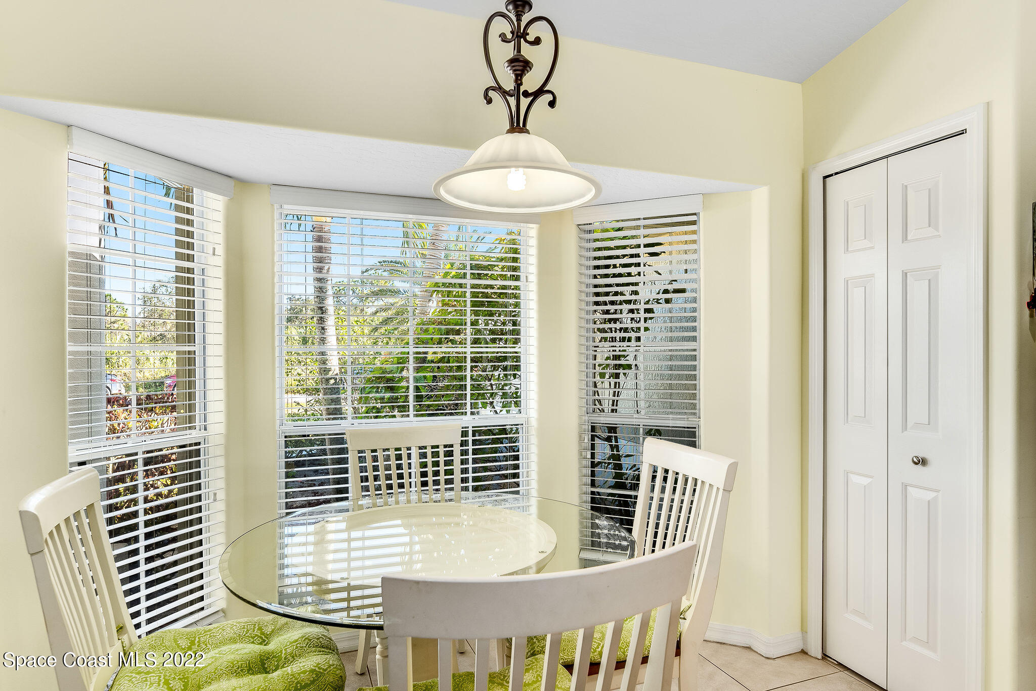 1566 Eagles Circle Sebastian, FL 32958 - Photo 22 of 59 a view of a dining room with furniture window and outside view