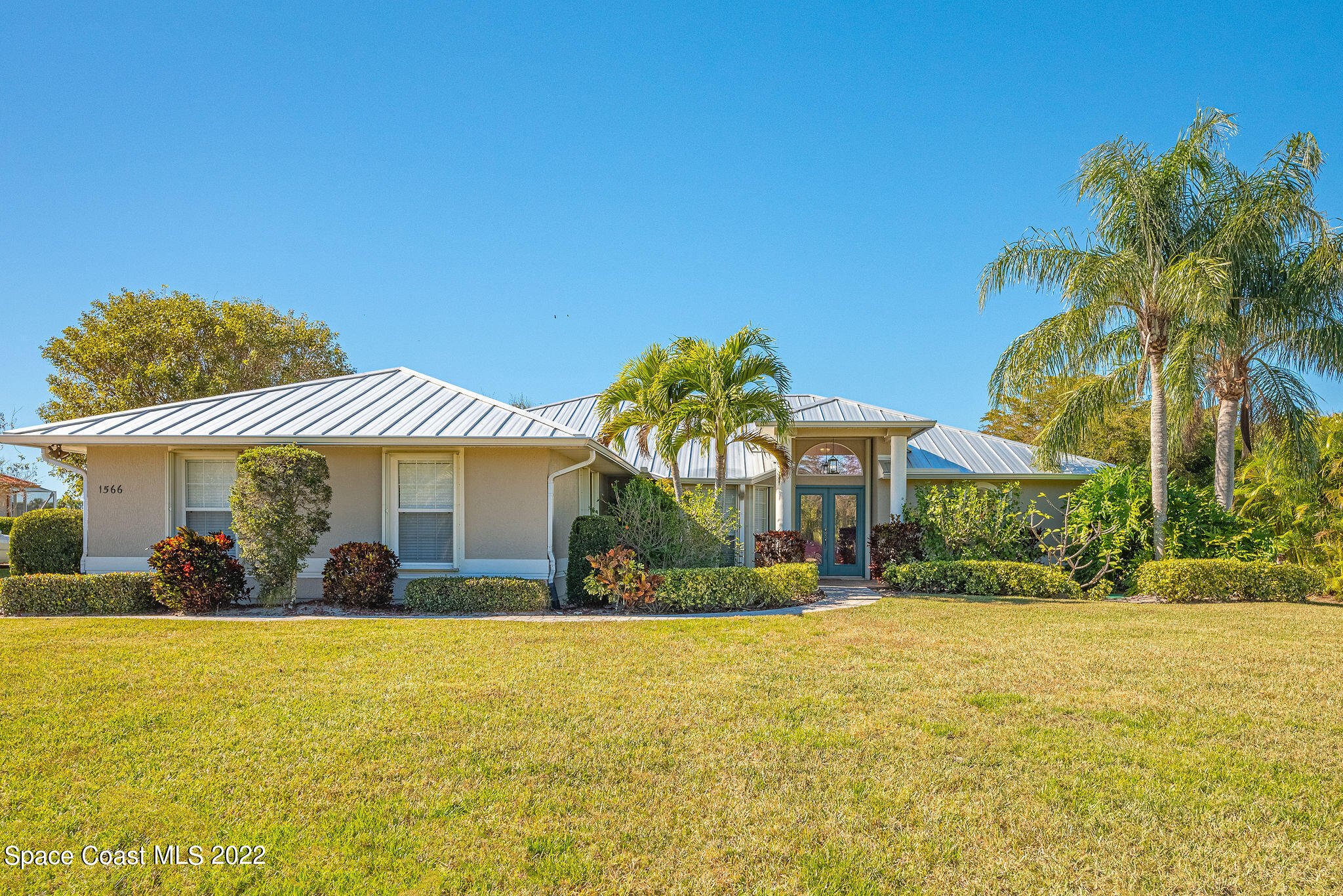 1566 Eagles Circle Sebastian, FL 32958 - Photo 3 of 59 a front view of house with yard