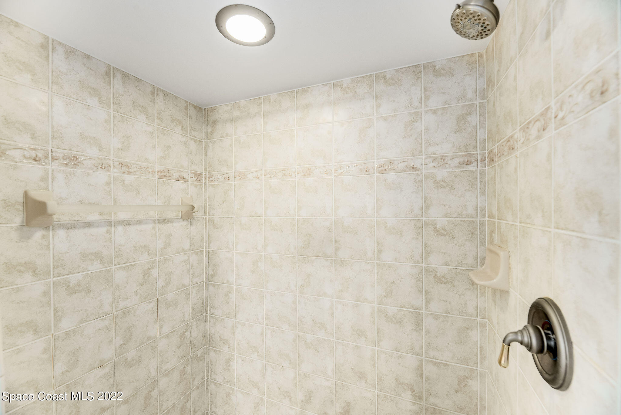 1566 Eagles Circle Sebastian, FL 32958 - Photo 37 of 59 a bathroom with a shower