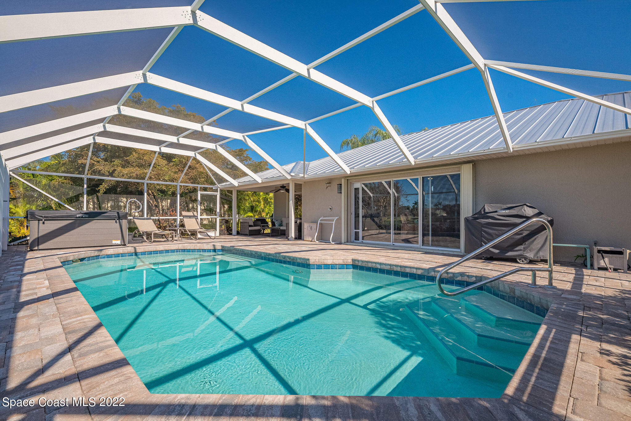 1566 Eagles Circle Sebastian, FL 32958 - Photo 48 of 59 a view of a backyard with a patio and a patio