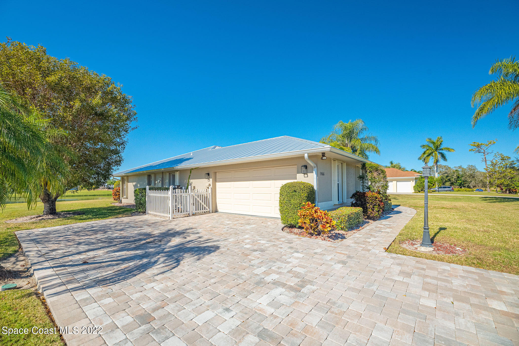 1566 Eagles Circle Sebastian, FL 32958 - Photo 9 of 59 a view of a swimming pool with a lounge chairs