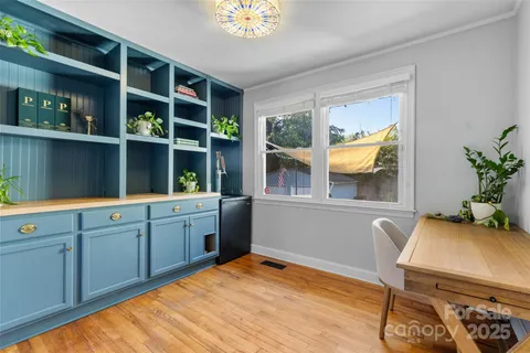 a kitchen with a sink and a window