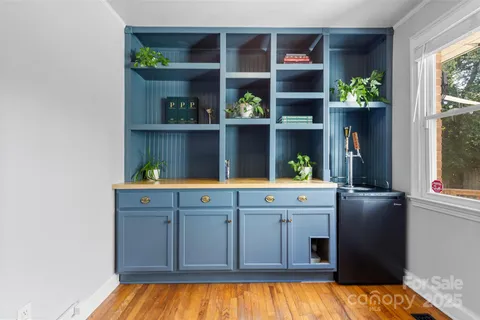 a kitchen with a sink and a window