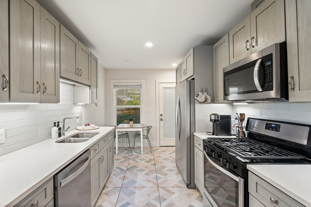2702 Crest Avenue, Unit 1 Austin, TX 78702 - Photo 16 of 29 This well-appointed kitchen blends modern upgrades with timeless design.