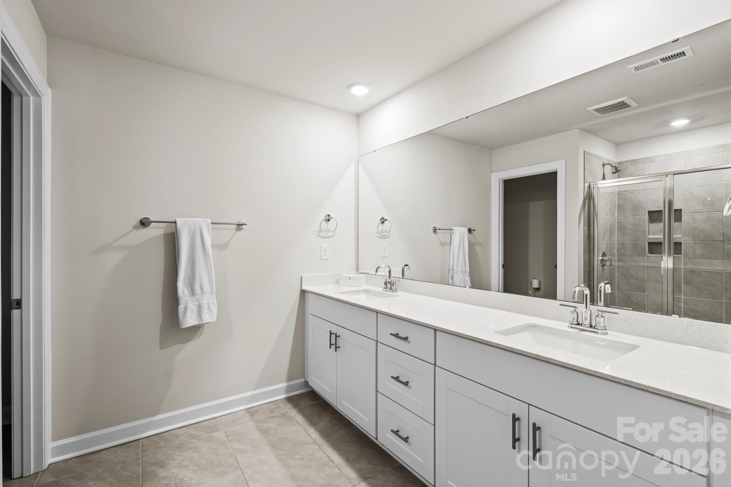 11955 Old Statesville Road Huntersville, NC 28078 - Photo 16 of 20 a spacious bathroom with a double vanity sink mirror and