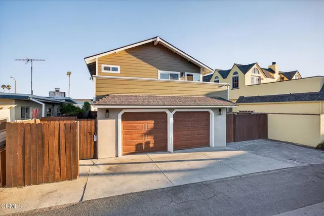 a kitchen with cabinets and window