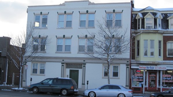 136 Broadway, Unit 3 Somerville, MA 02145 - Photo 1 of 11 a car parked in front of a building