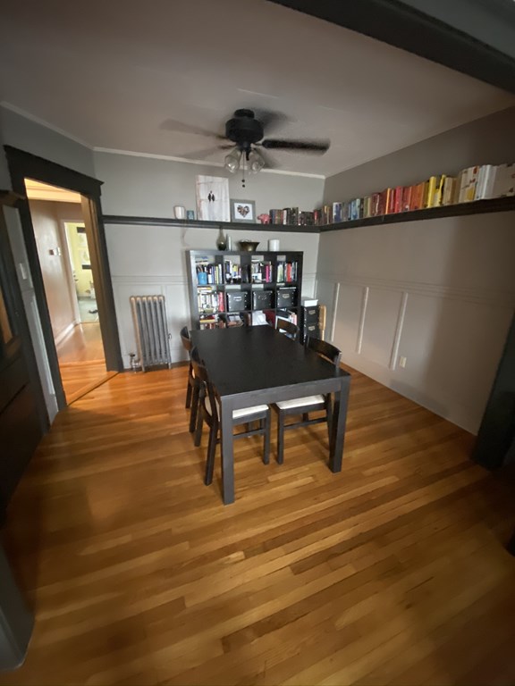 136 Broadway, Unit 3 Somerville, MA 02145 - Photo 7 of 11 a view of a hallway with wooden floor