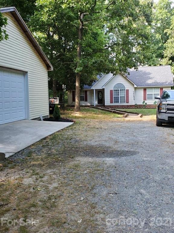 4125 Pigg Mattox Road Monroe, NC 28112 - Photo 2 of 3 a view of a house with a yard