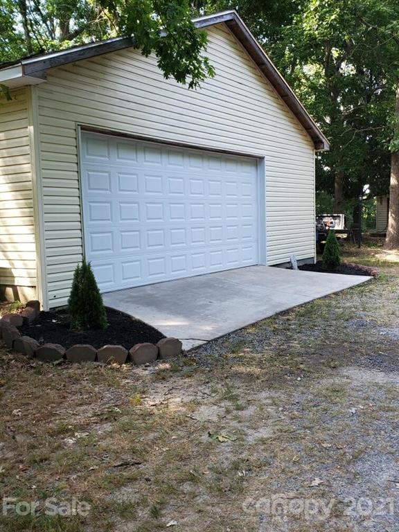 4125 Pigg Mattox Road Monroe, NC 28112 - Photo 3 of 3 a view of a backyard of the house