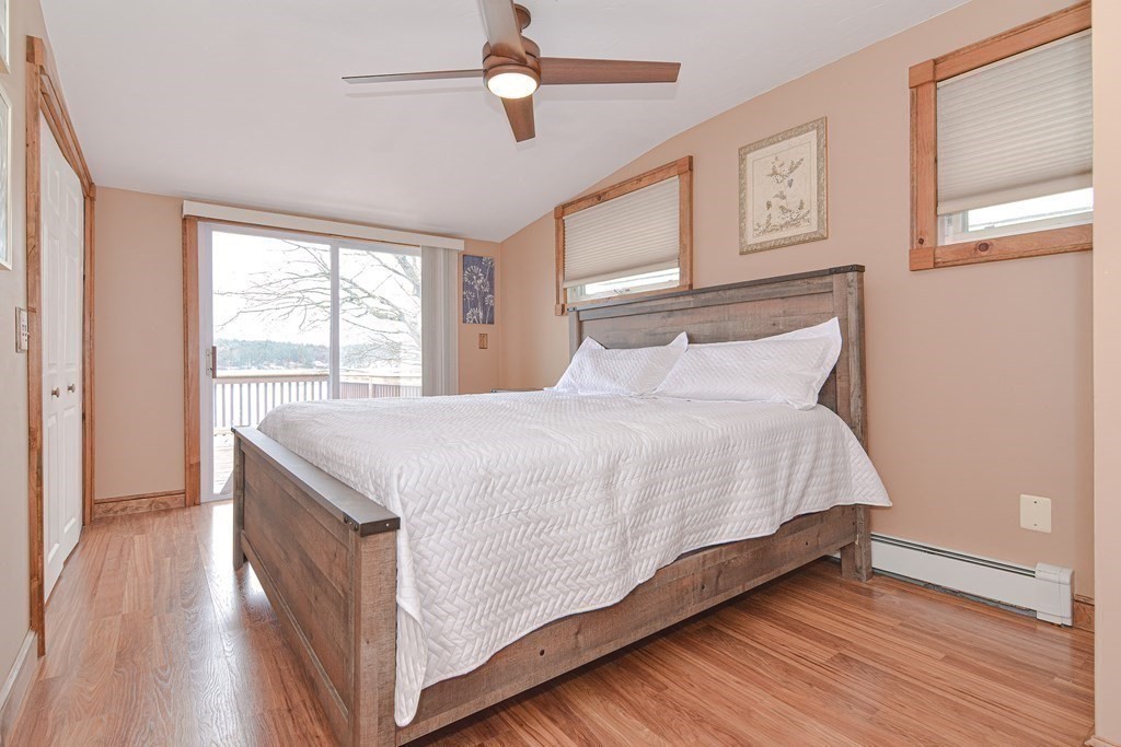 32 Allen Road Brookfield, MA 01506 - Photo 13 of 40 a large bed sitting in a bedroom next to a window