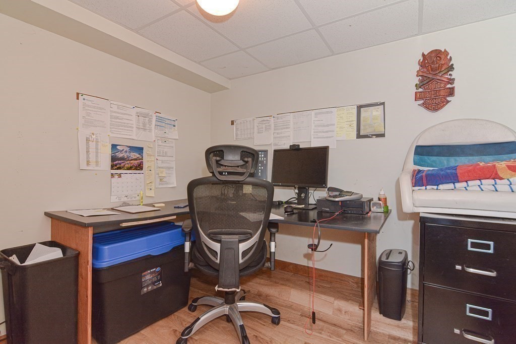 32 Allen Road Brookfield, MA 01506 - Photo 18 of 40 a view of a workspace with furniture and a window