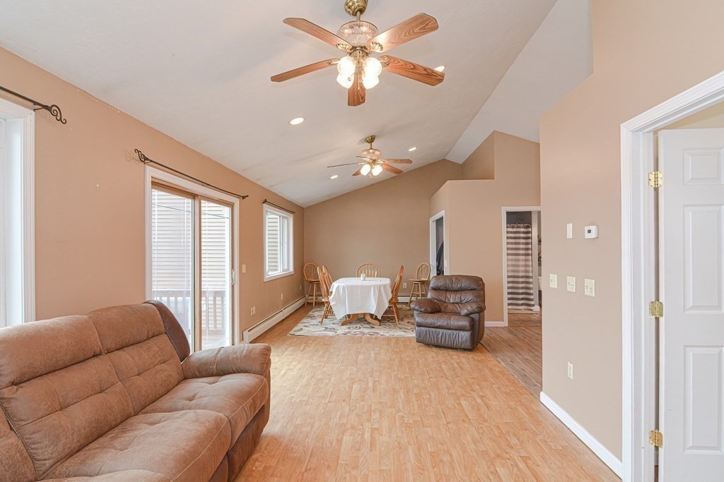 32 Allen Road Brookfield, MA 01506 - Photo 21 of 40 a living room with furniture and a chandelier