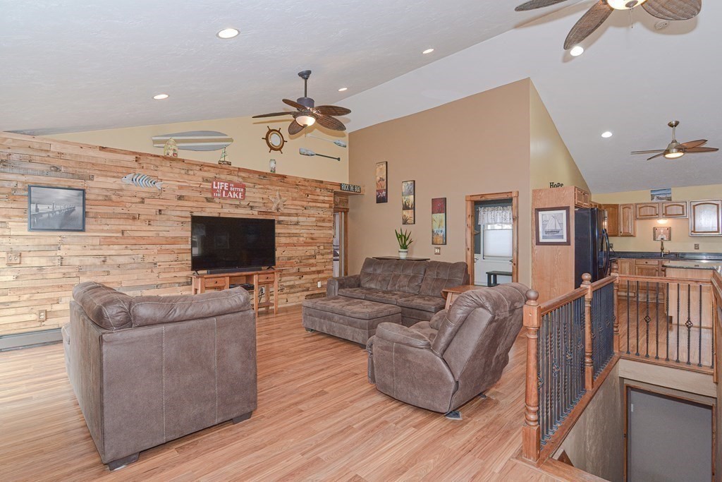 32 Allen Road Brookfield, MA 01506 - Photo 3 of 40 a living room with furniture and a flat screen tv