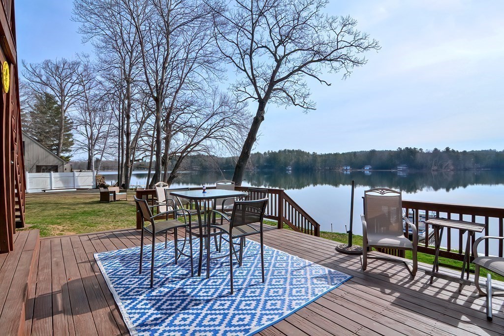 32 Allen Road Brookfield, MA 01506 - Photo 32 of 40 a view of a roof deck with table and chairs