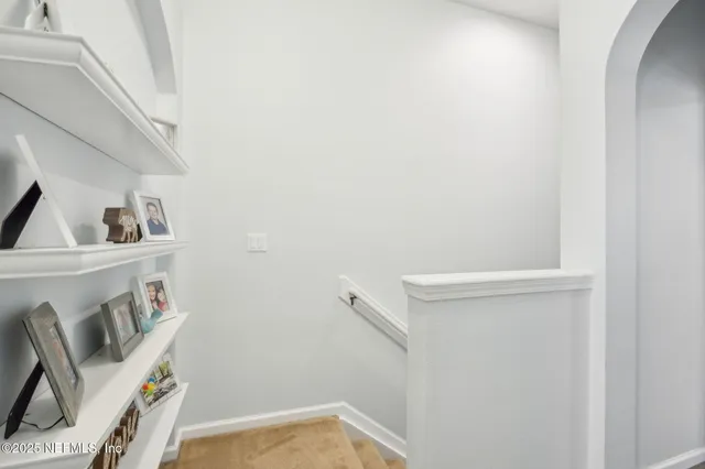 a view of storage and utility room with washer and dryer