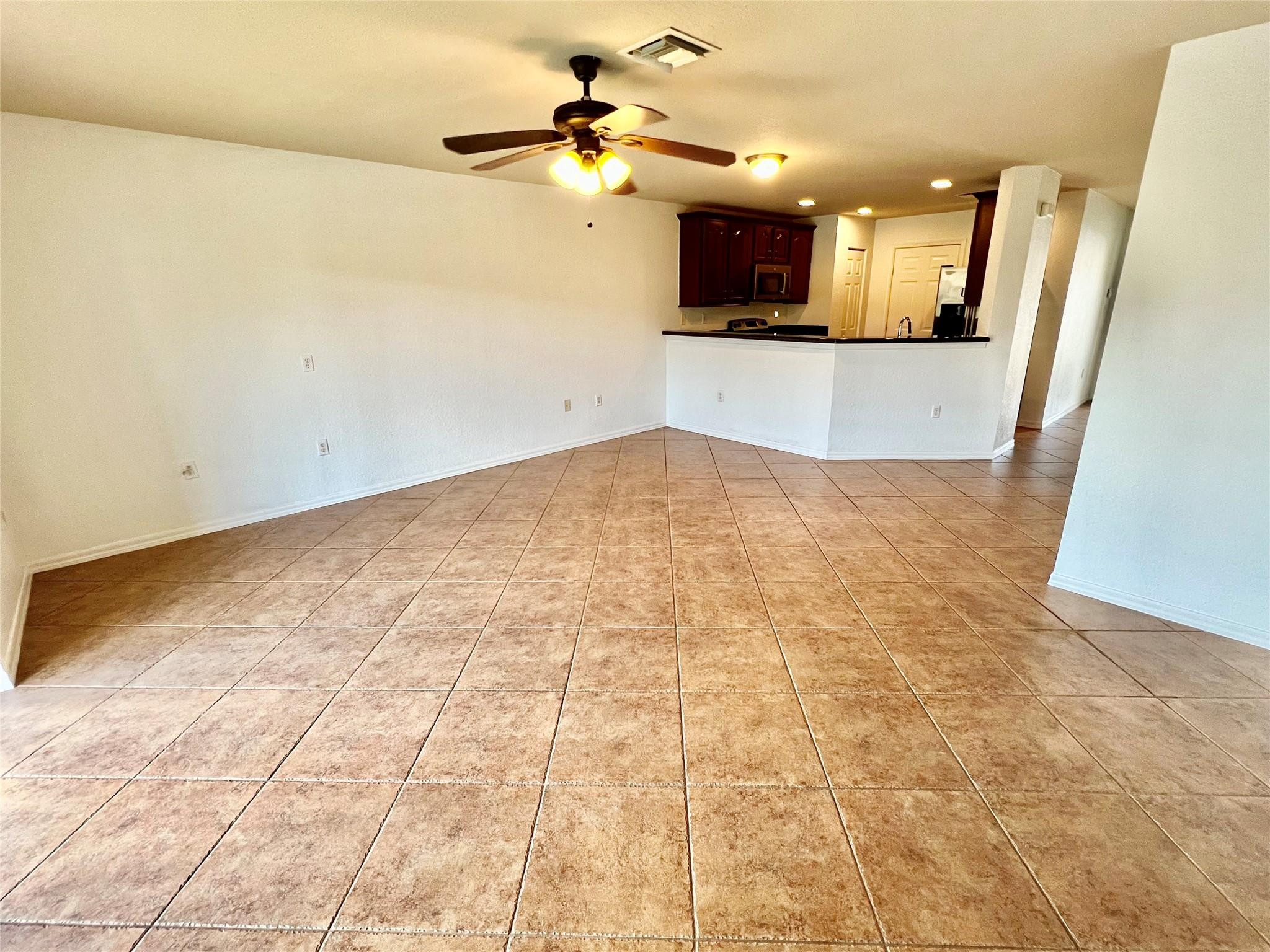 5964 Abbey Road, Unit 5964 Tamarac, FL 33321 - Photo 23 of 27 Great room