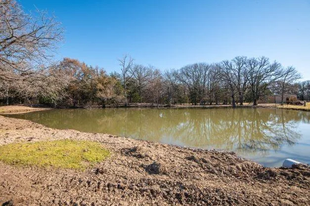 a view of a lake with a city