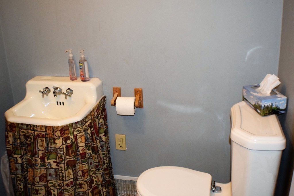 267 Wheelwright Road Barre, MA 01005 - Photo 19 of 29 a bathroom with a sink toilet and mirror
