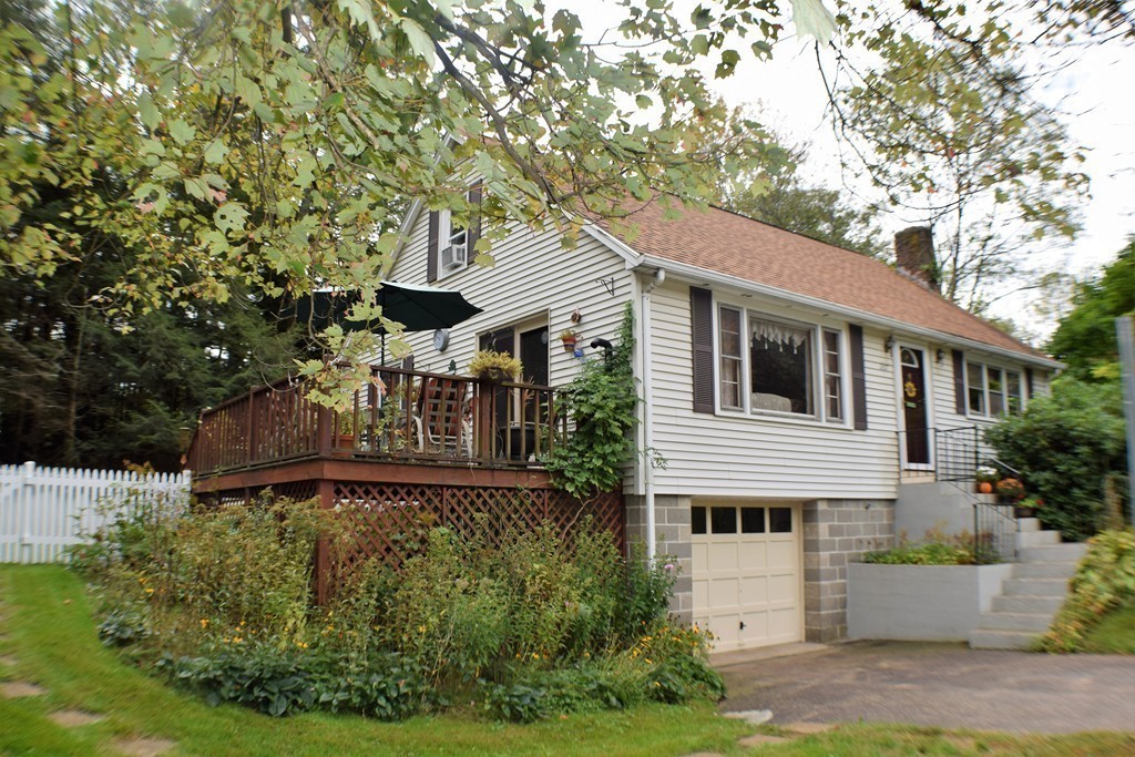 267 Wheelwright Road Barre, MA 01005 - Photo 2 of 29 a front view of a house with a yard
