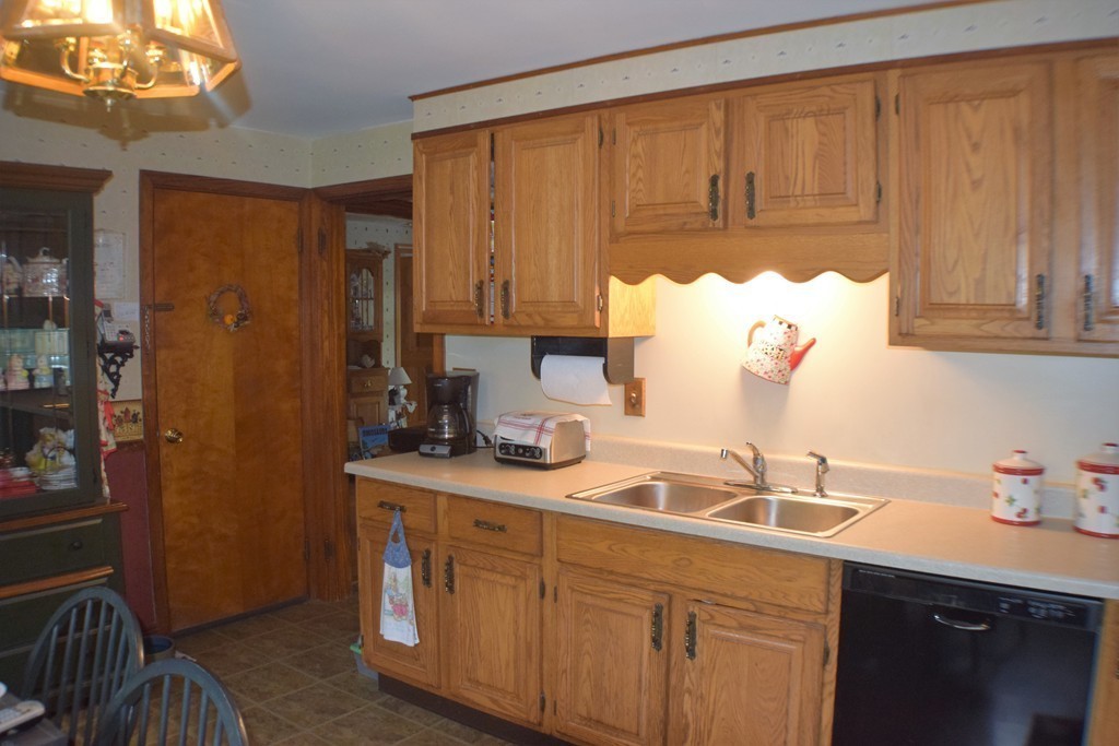 267 Wheelwright Road Barre, MA 01005 - Photo 5 of 29 a kitchen with a sink cabinets and appliances