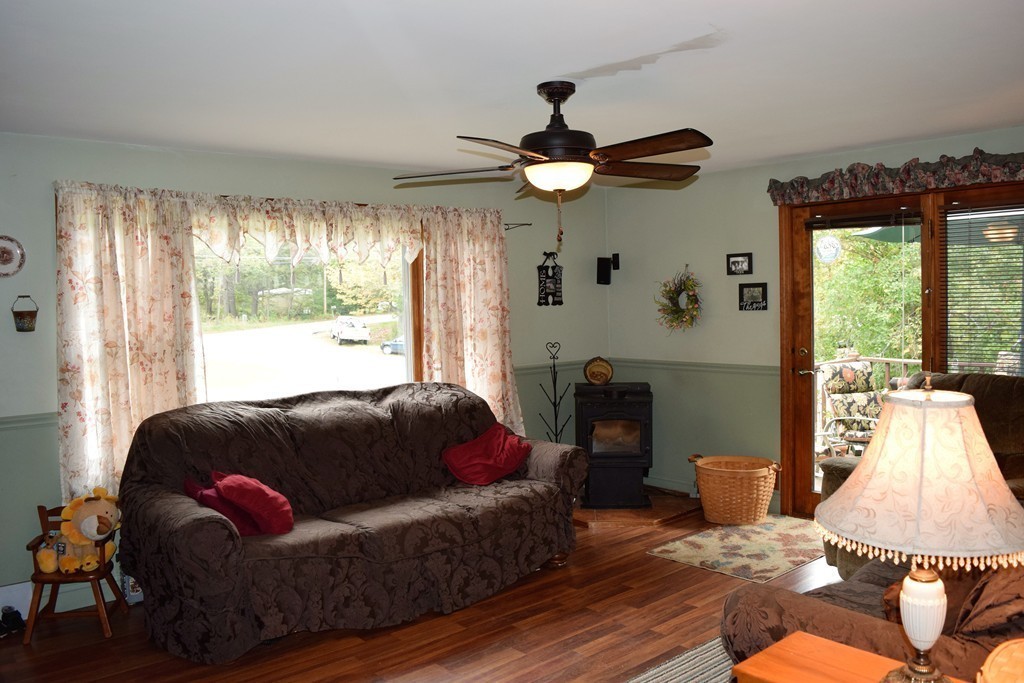 267 Wheelwright Road Barre, MA 01005 - Photo 7 of 29 a living room with furniture and a large window