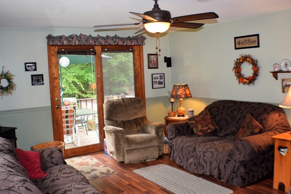 267 Wheelwright Road Barre, MA 01005 - Photo 9 of 29 a living room with furniture and a window