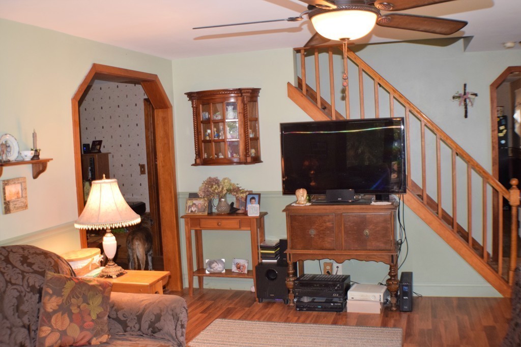 267 Wheelwright Road Barre, MA 01005 - Photo 10 of 29 a living room with furniture a rug and a window