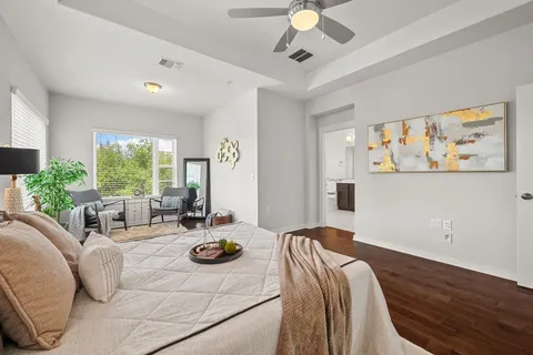 a view of a livingroom with furniture window and outside view