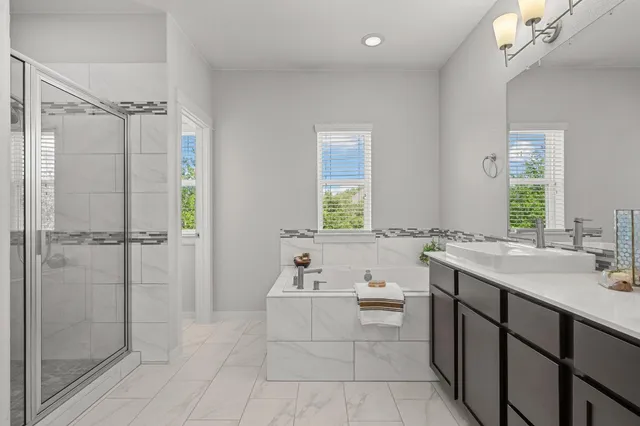 a view of storage and utility room with washer and dryer