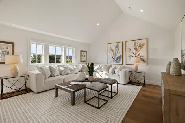 a living room with furniture and a couch