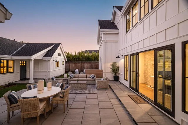 a outdoor space with lots of tables and chairs