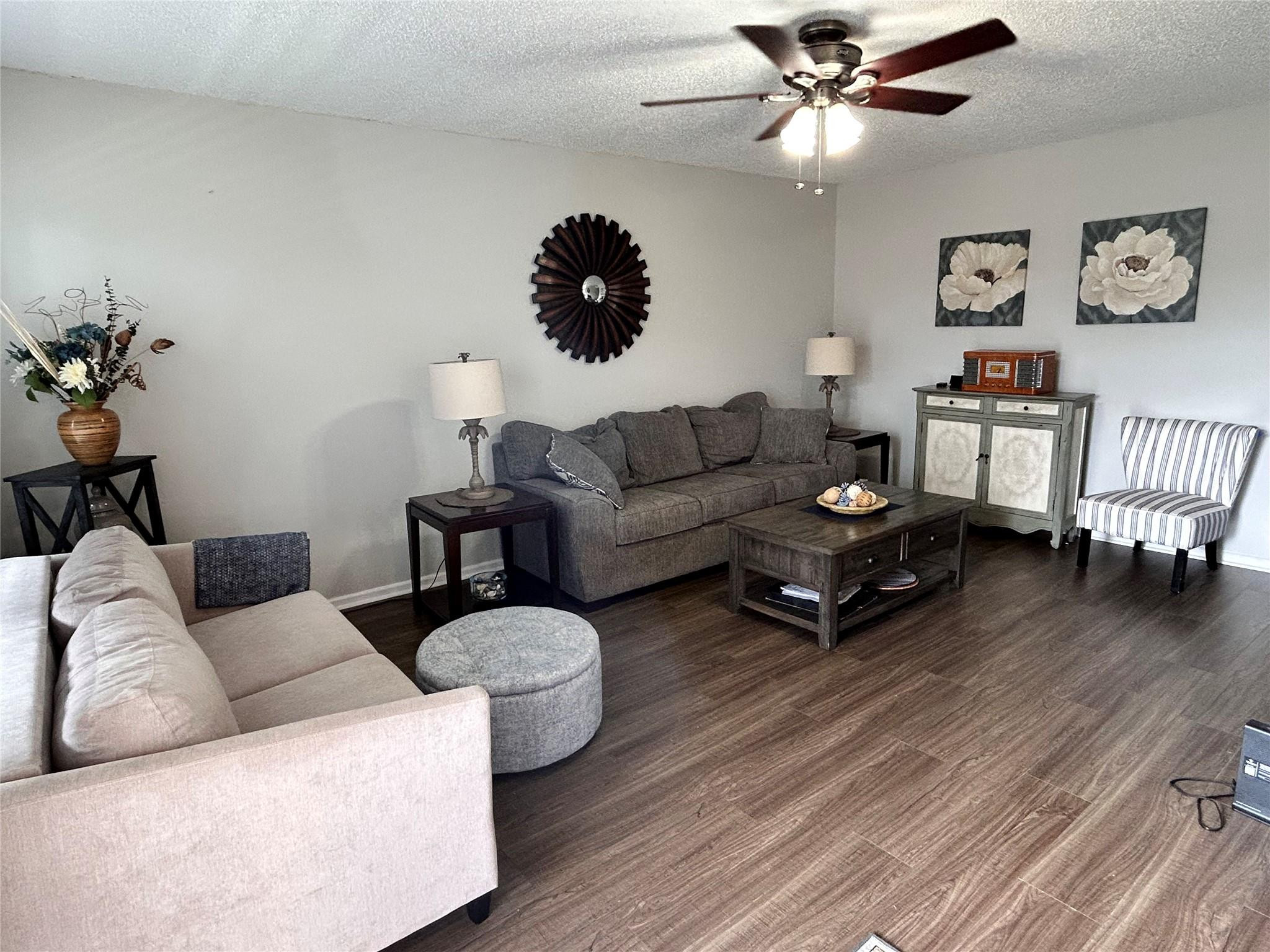 210 Fanshaw East, Unit 210 Boca Raton, FL 33434 - Photo 7 of 62 Cream loveseat leaves with seller.