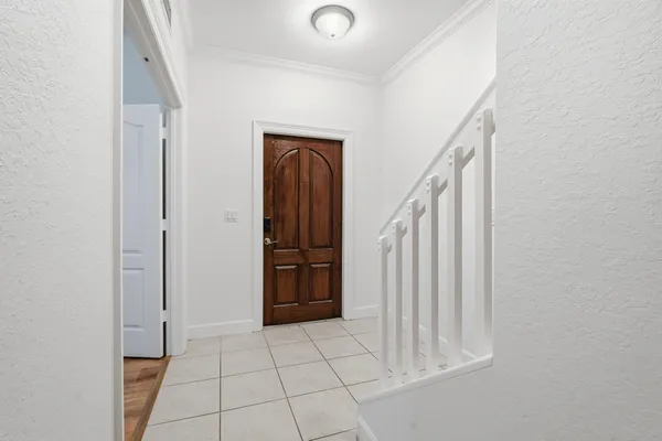 a view of an entryway with staircase