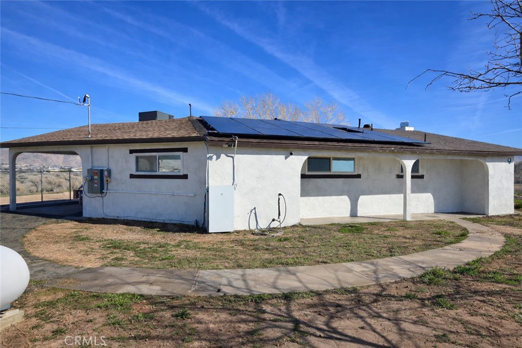 14695 Ocotilla Road Apple Valley, CA 92307 - Photo 3 of 16 a view of a house with backyard