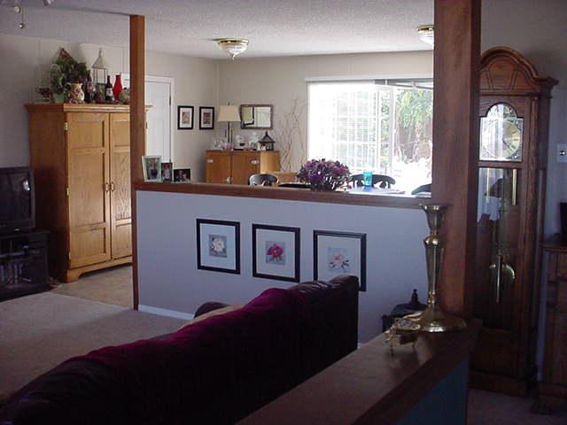 504 Meadowbrook Road Yakima, WA 98903 - Photo 16 of 18 a living room with furniture and chandelier