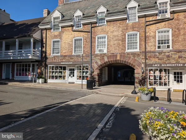 a front view of a building with many windows