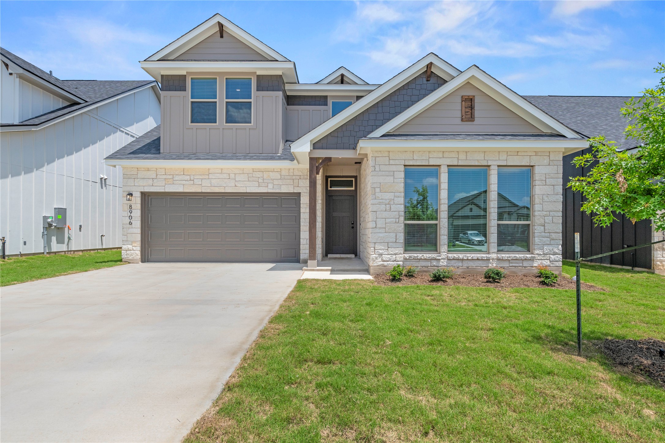 540 Gus Loop Georgetown, TX 78626 - Photo 5 of 36 Please Note: These exterior photos are not of the actual home but are of a completed one with a similar floor plan. Finishes, features, and layouts may vary.
