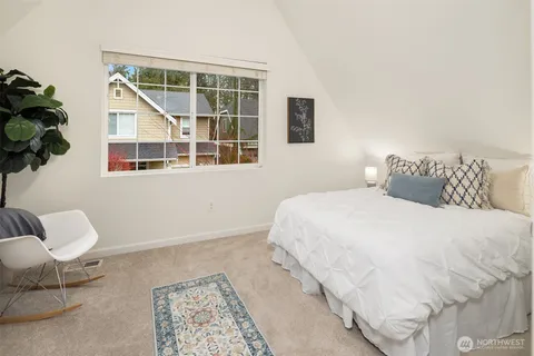 a bathroom with a sink toilet and mirror