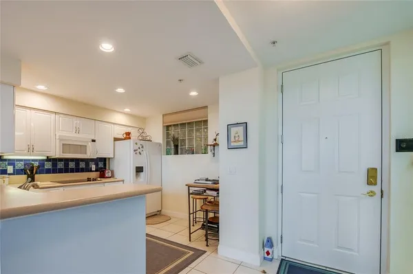 a view of counter top space with stainless steel appliances lots of counter top space