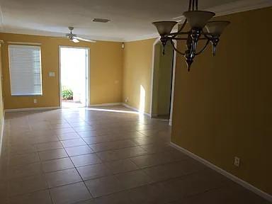 6397 Adriatic Way Greenacres, FL 33413 - Photo 12 of 29 a view of a room with gym equipment