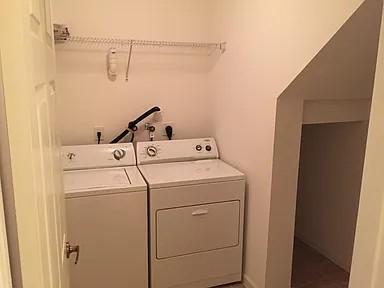 6397 Adriatic Way Greenacres, FL 33413 - Photo 21 of 29 a utility room with dryer and washer