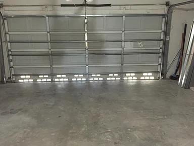 6397 Adriatic Way Greenacres, FL 33413 - Photo 22 of 29 a view of a room with racks on the wall