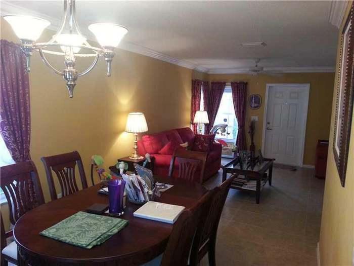 6397 Adriatic Way Greenacres, FL 33413 - Photo 25 of 29 a view of a dining room with furniture
