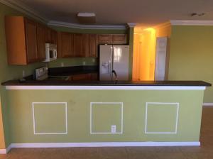 6397 Adriatic Way Greenacres, FL 33413 - Photo 3 of 29 a bathroom with a sink and a mirror