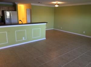 6397 Adriatic Way Greenacres, FL 33413 - Photo 4 of 29 a room with a mirror and a fan