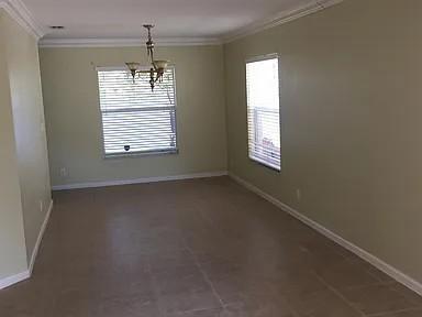 6397 Adriatic Way Greenacres, FL 33413 - Photo 10 of 29 a view of an empty room with a window